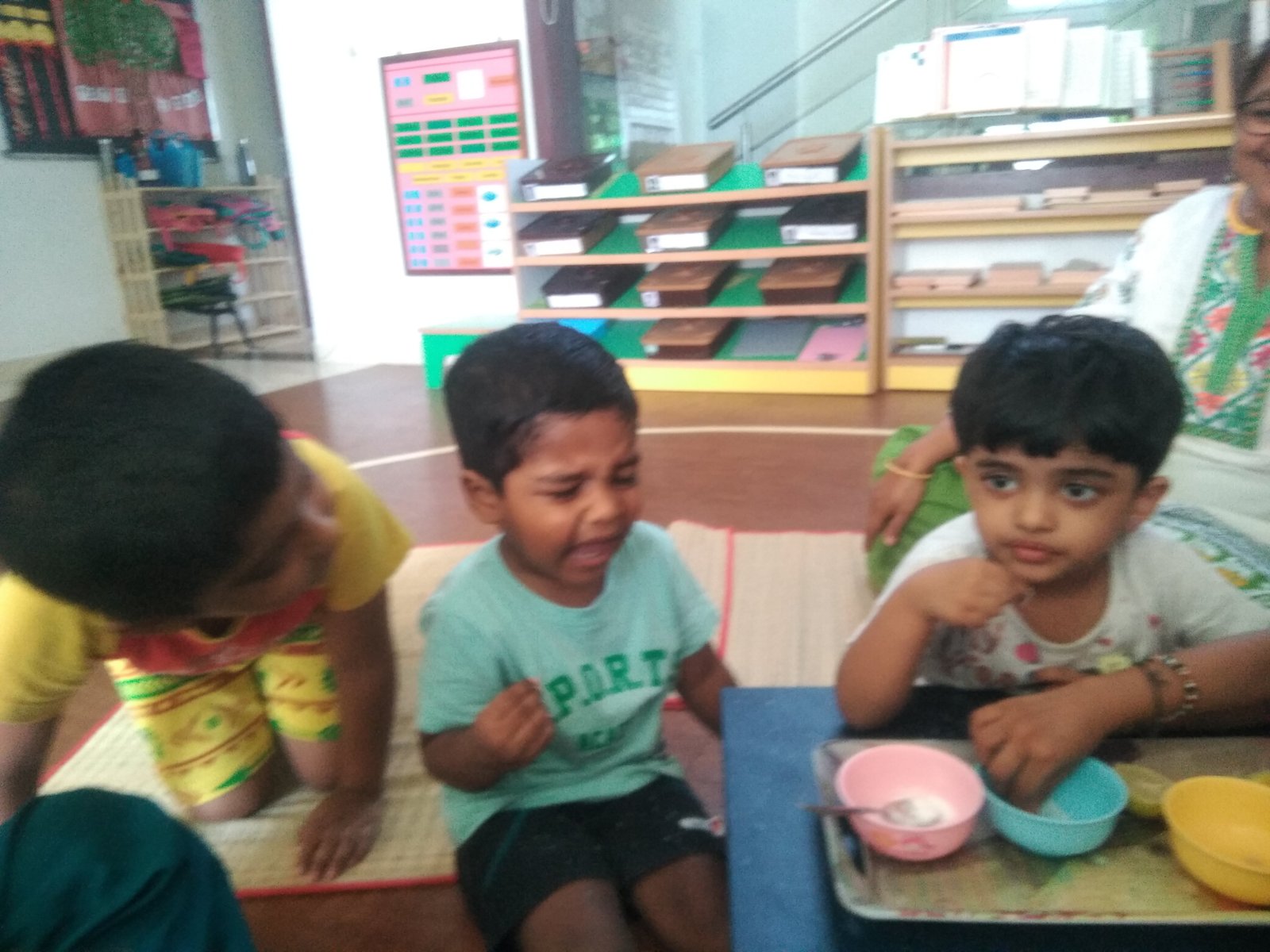 Montessori Guide Presenting Materials